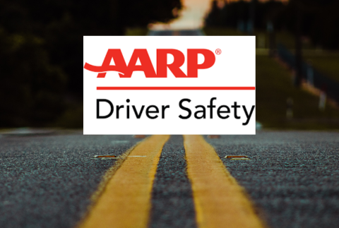 Street view with words AARP Driver Safety.