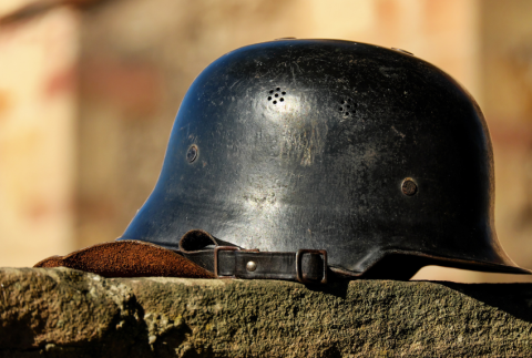 Side view of an army helmet.