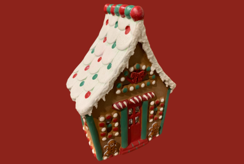 side view of ceramic gingerbread house.