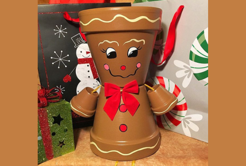 Gingerbread boy made out of clay pots.