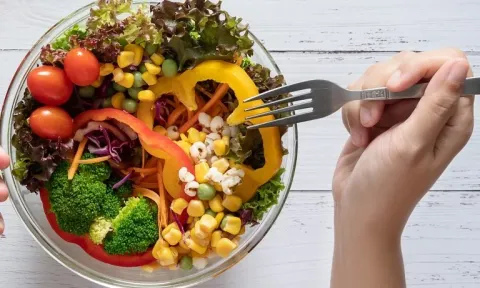 Vegetable/Fruit Bowl with hand and fork