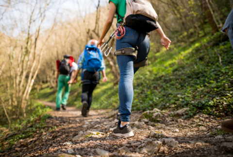 Three people hiking.