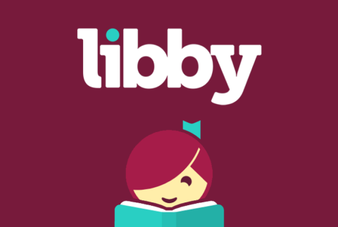 Picture of a girl reading a book with the word libby