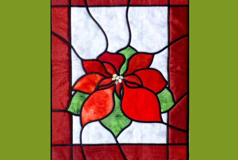 Stained glass poinsettia picture. 