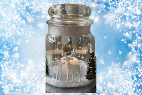 Jar with winter decor and snow background.
