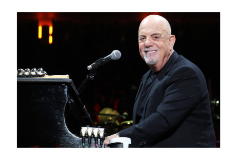 Billy Joel at a piano
