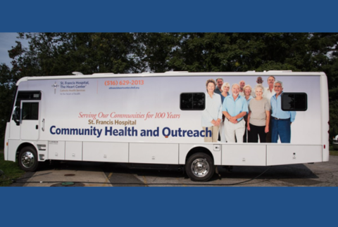 Catholic Health Bus side view. 