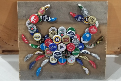 Crab made out of bottle caps.