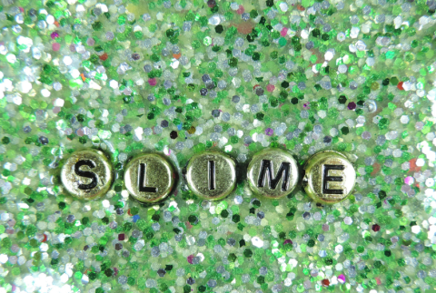 Glitter slime with word slime in it.