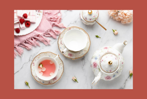 Top view of English tea pot and cups. 