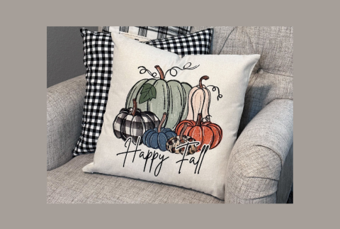 Happy fall throw pillow with pumpkins. 