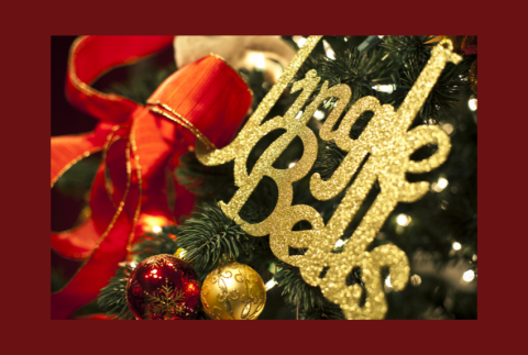 Word Jingle Bells on a tree with an ornament. 