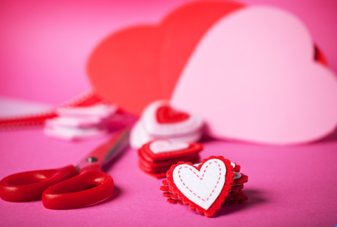 Scissor with heart shapes. 