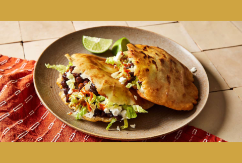 Two gorditas on a plate. 