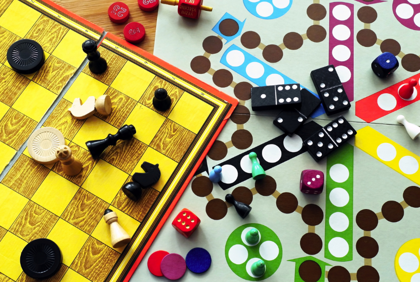 Top view of multiple board games.