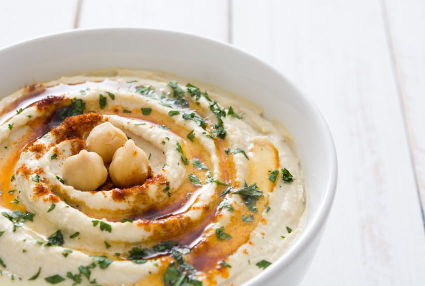 Top view of chick peas and hummus.