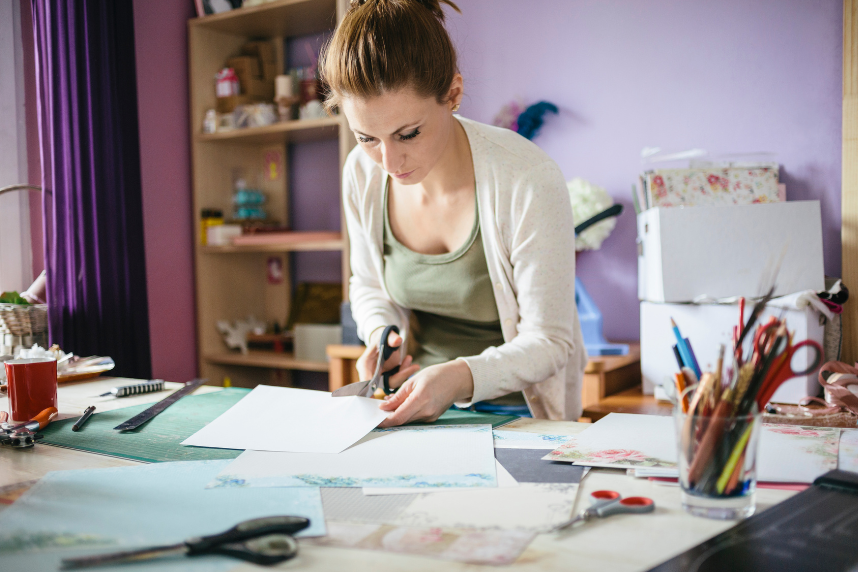 Woman Cutting Paper