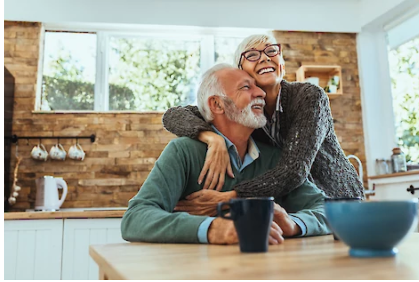 Picture of two older adults at their kitchen table