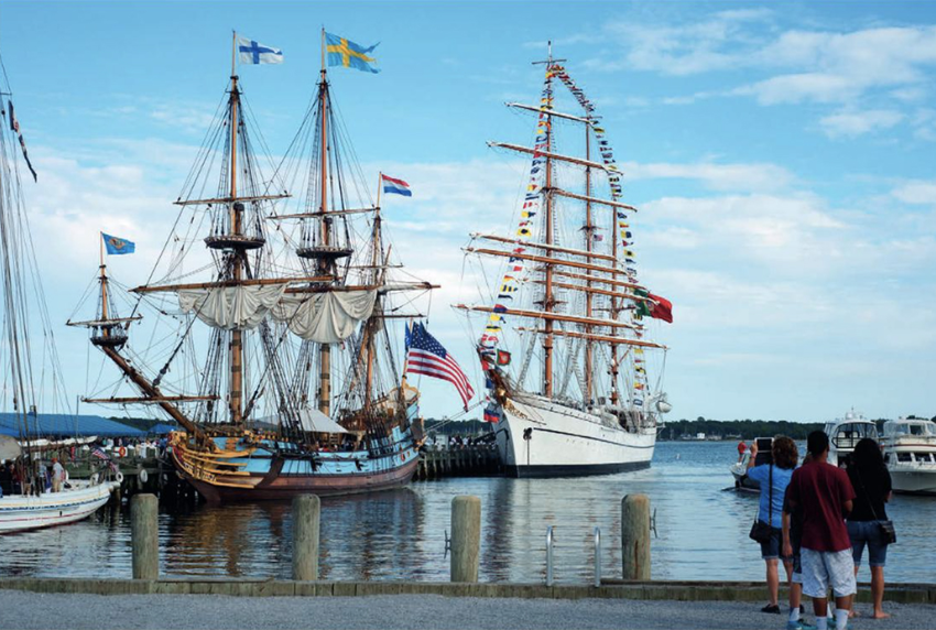 Two sailboats in the harbor. 