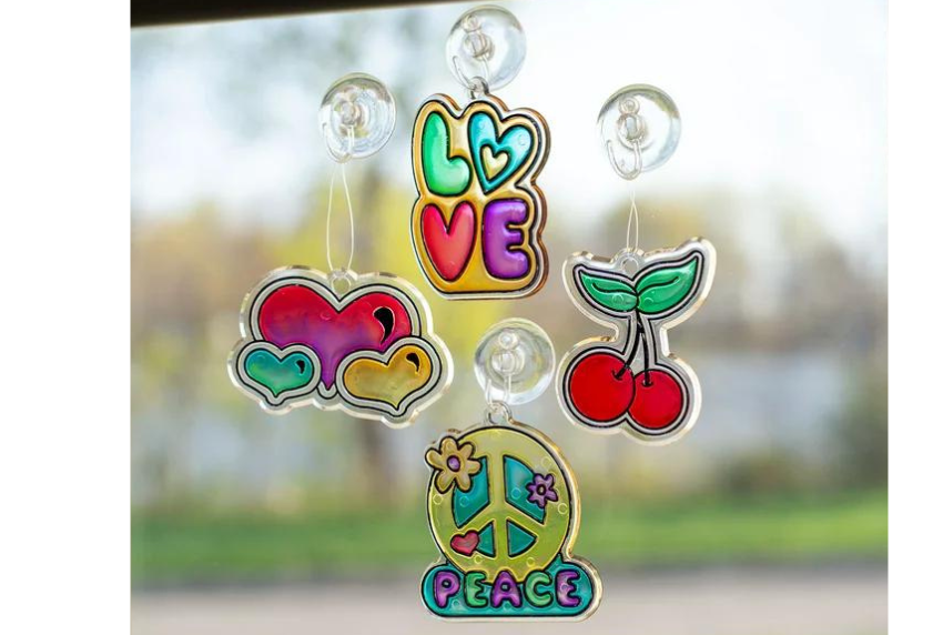 Picture of four suncatchers on window