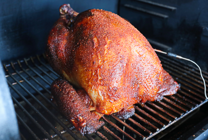 Smoked turkey on a grate. 