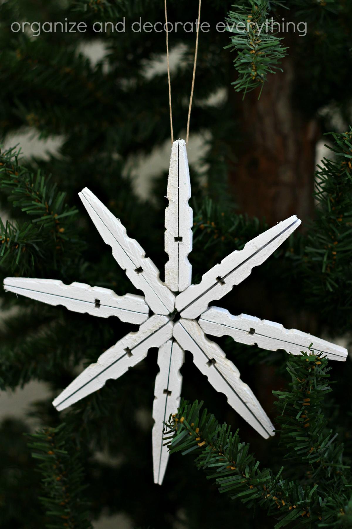 Picture of clothespins arraigned like a snowflake