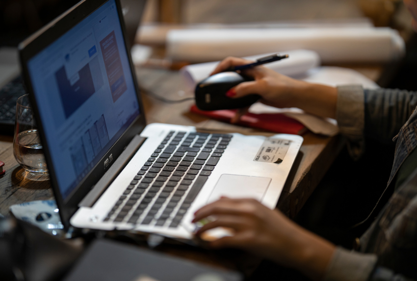 Side view of opened laptop. 