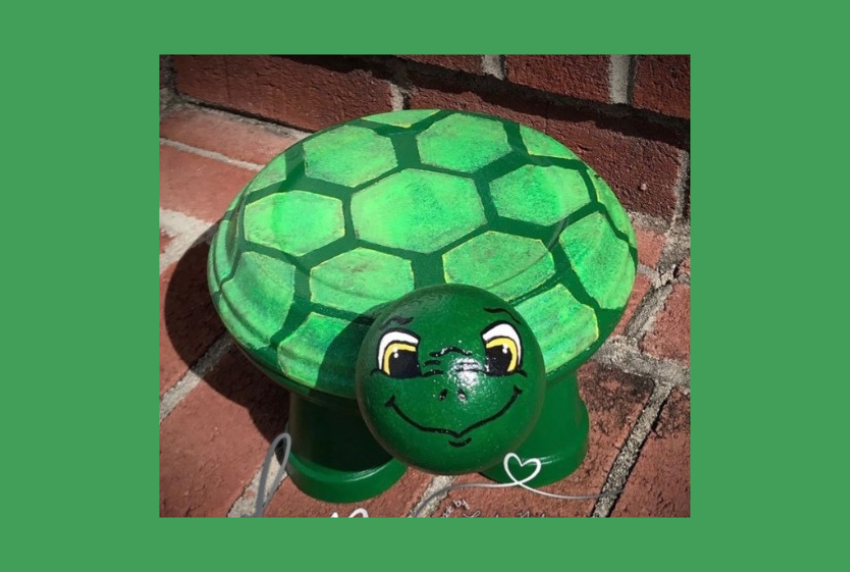 Turtle planter made out of clay pots. 