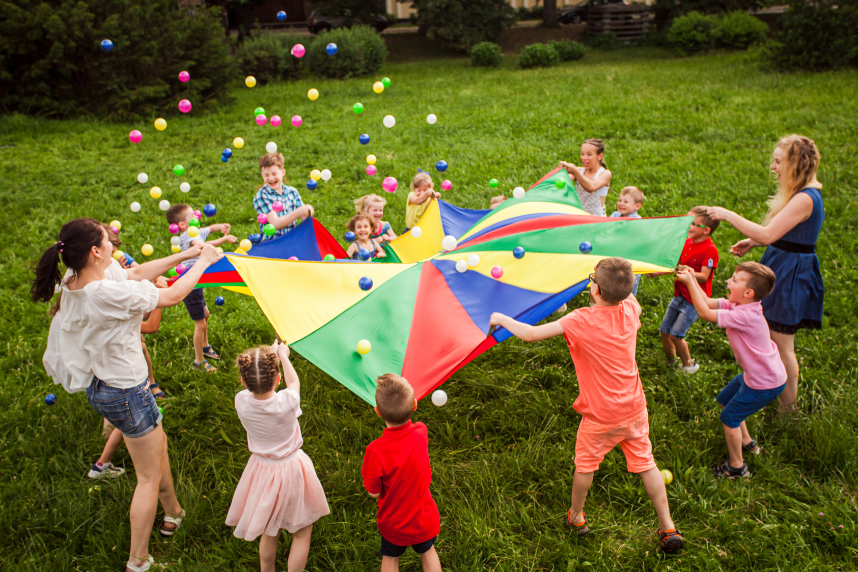 Children with a parachute