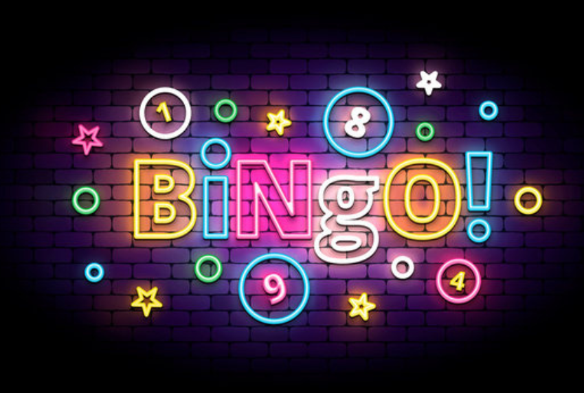 Neon sign that reads BINGO. 