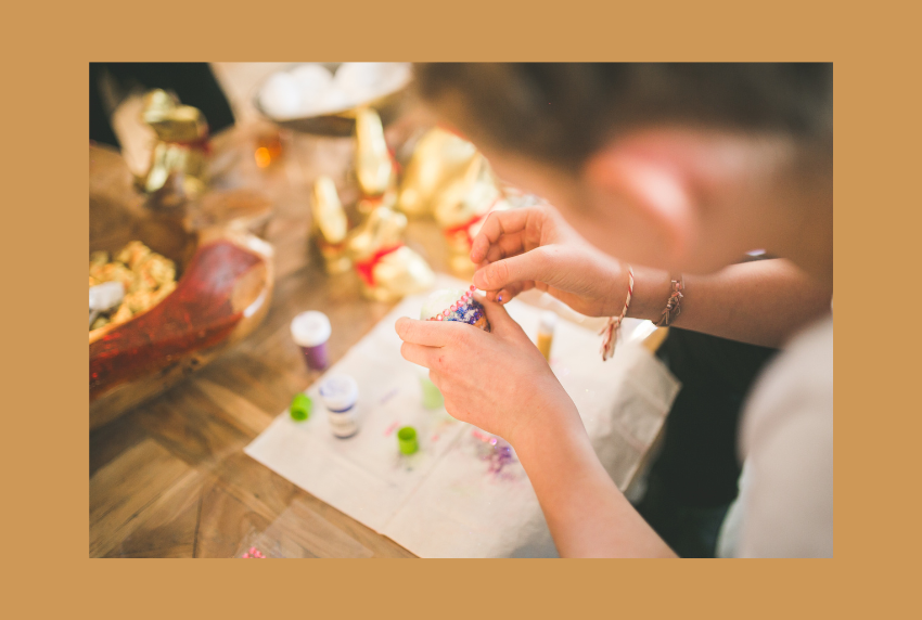 Top view of hands crafting.